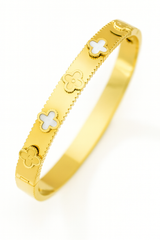 Gold bracelet with clover designs on a white background