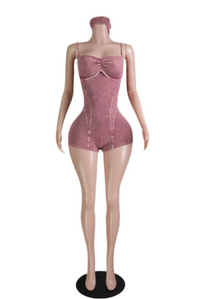 Sculpted seamless romper set with ruched bust and contour seams, shown in lavender, black, and rose pink with matching headbands on mannequin display.