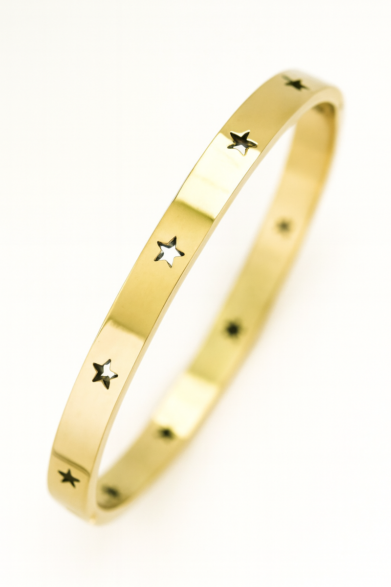 Gold bracelet with star designs on a white background